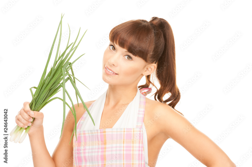 beautiful housewife with spring onions over white beautiful housewife with spring onions over white