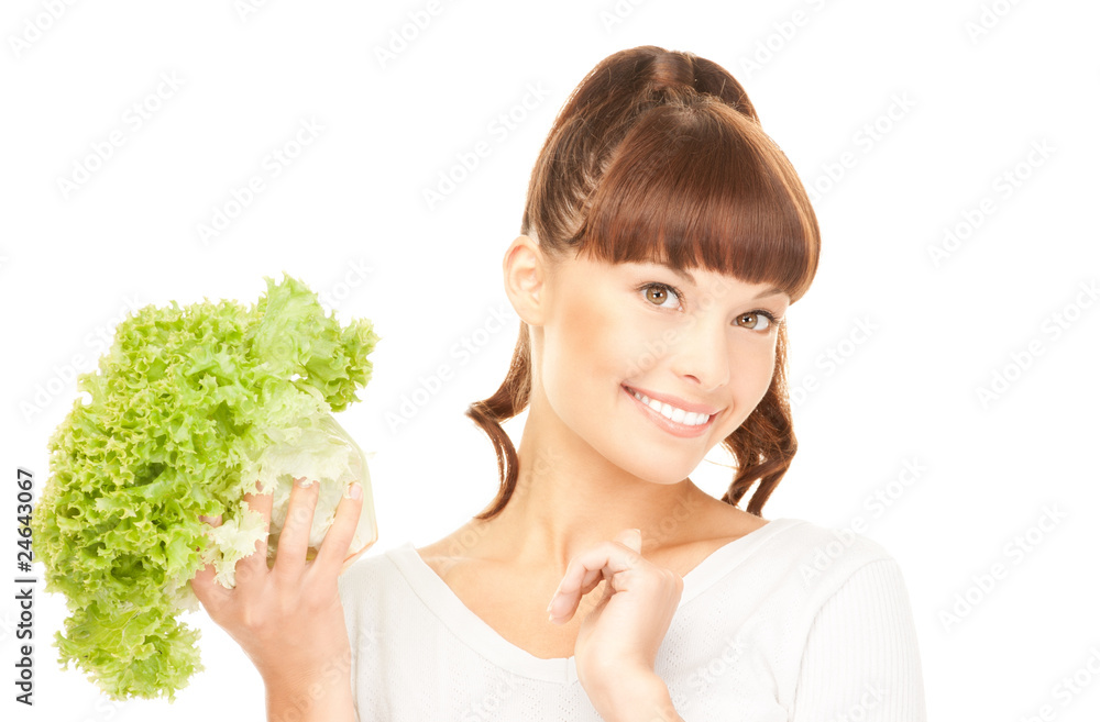 beautiful housewife with lettuce over white beautiful housewife with lettuce over white