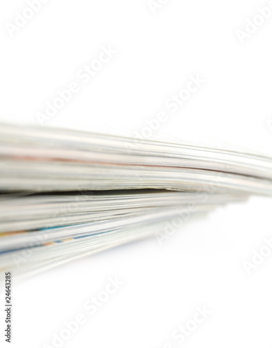 Stack of magazines on white
