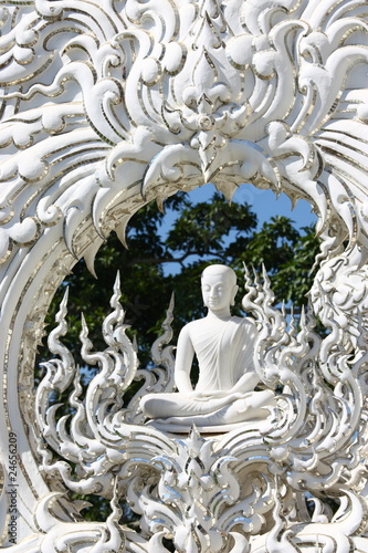 White monk meditation statue in Chiangrai Rong Khun temple, nort