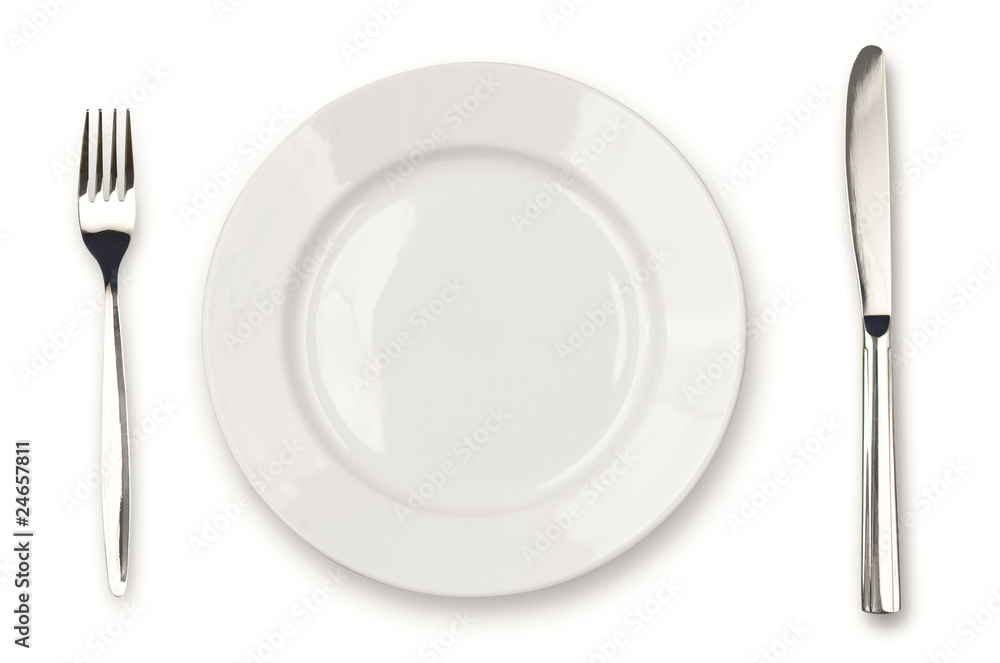Knife, white plate and fork isolated Knife, white plate and fork isolated