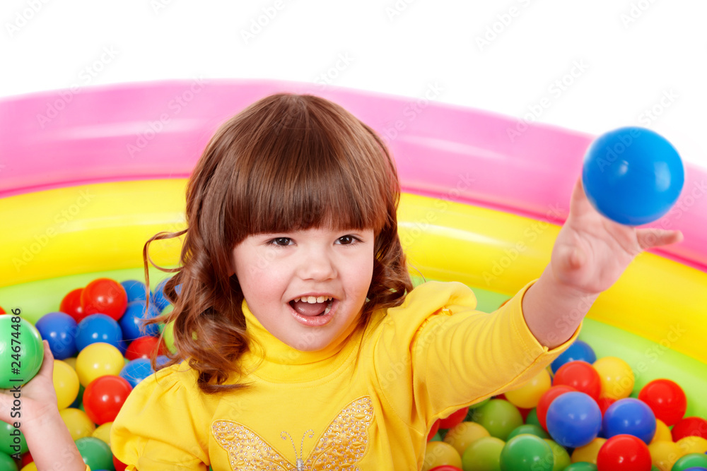 Little girl play in group colourful ball. Little girl play in group colourful ball.
