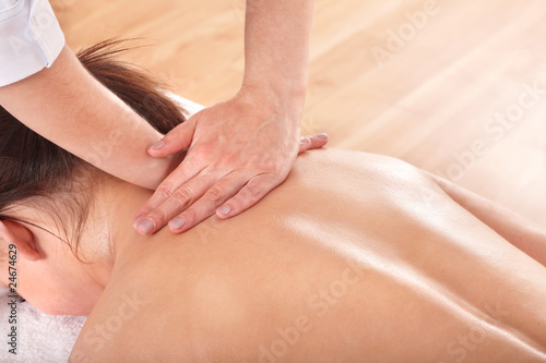 Girl having back massage.
