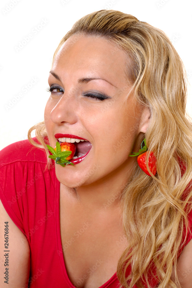Wink Cheesy girl with a strawberry on a white background Wink Cheesy girl with a strawberry on a white background
