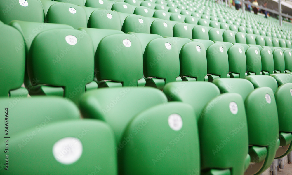 Safety plastic armchairs on stadium tribune Safety plastic armchairs on stadium tribune