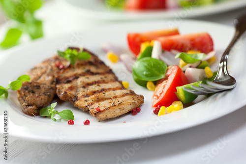 Grilled chicken with vegetables and herbs