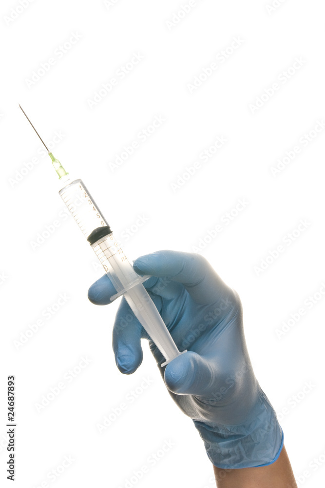 hand and syringe hand and syringe