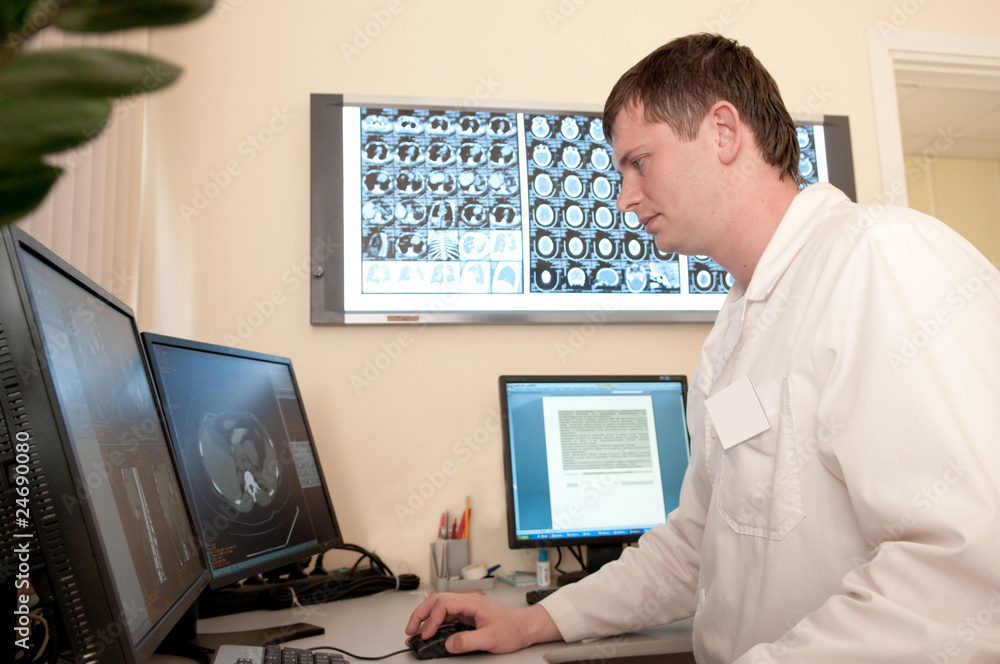 Fotografie Doctor with CT scan films