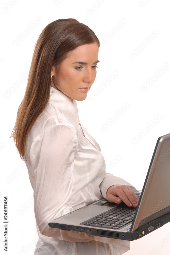 woman with a laptop and long hair woman with a laptop and long hair