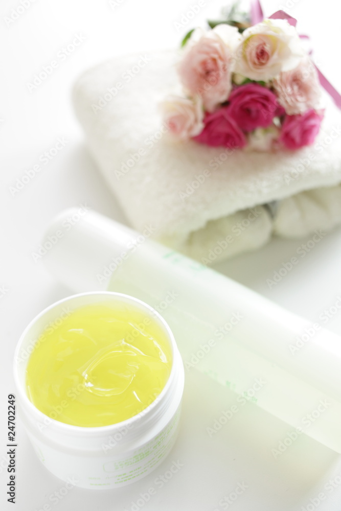 Flowers, towels and skincare cosmetic for beauty salon image