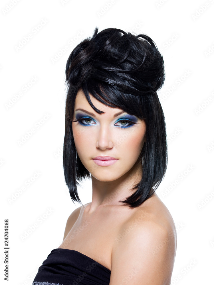 Fototapeta premium Face of a beautiful woman with blue make-up
