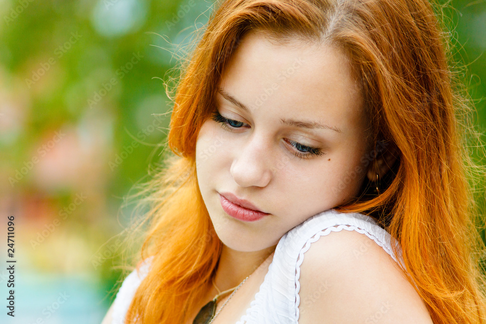 Portrait of beautiful sad young woman