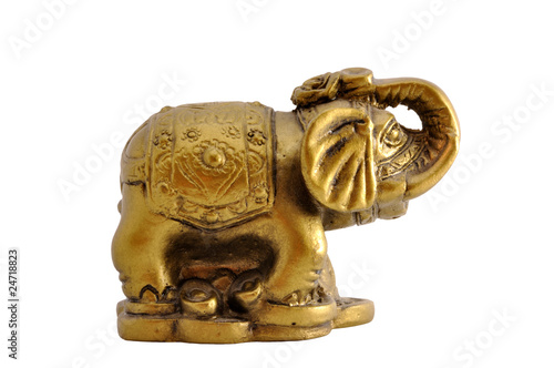 Ancient golden statue of an elephant isolated on white