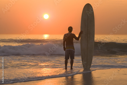 sunset surfer photo