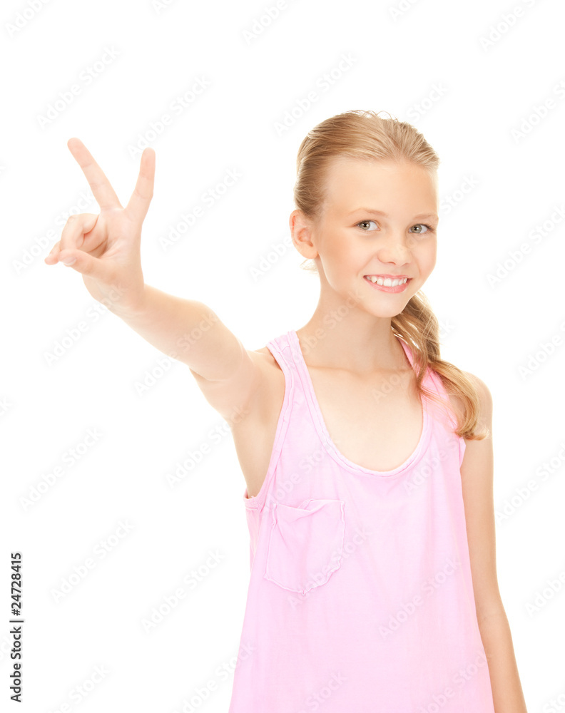 lovely girl showing victory sign