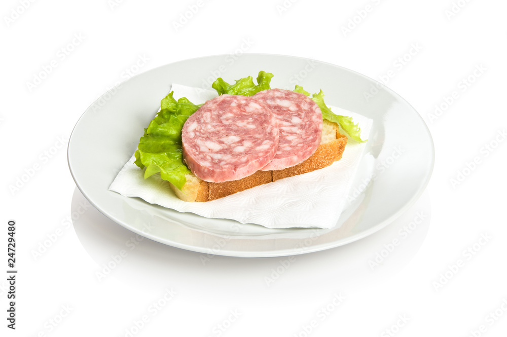 Open sandwich with two pieces of bloated sausage and lettuce Open sandwich with two pieces of bloated sausage and lettuce