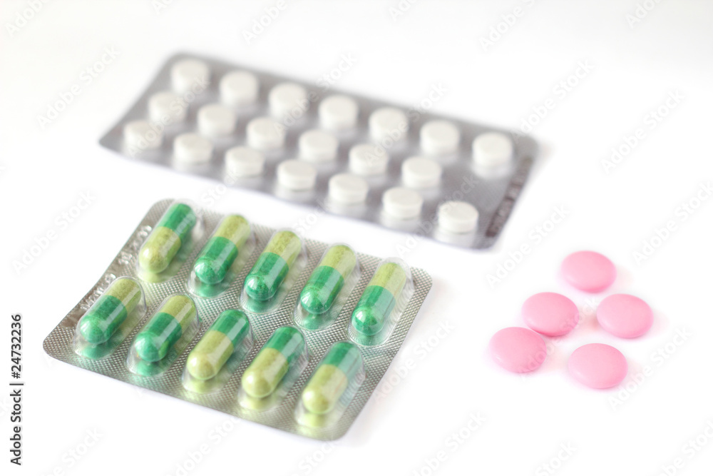 tablets in a package on a white background tablets in a package on a white background