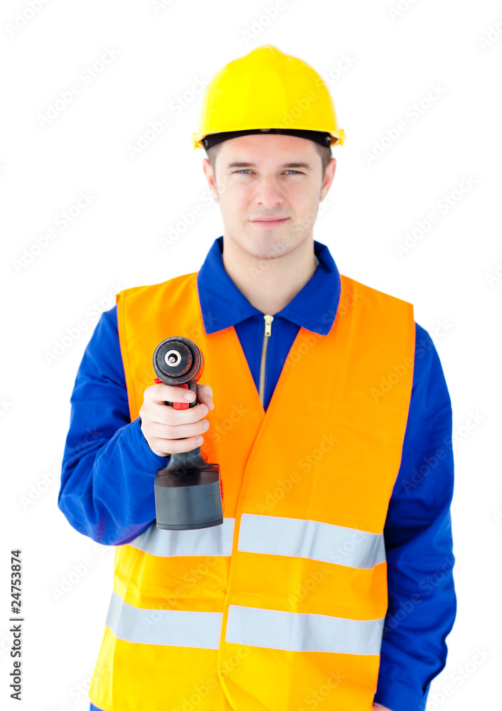 Young male worker wearing helmet and holding boring machine Young male worker wearing helmet and holding boring machine
