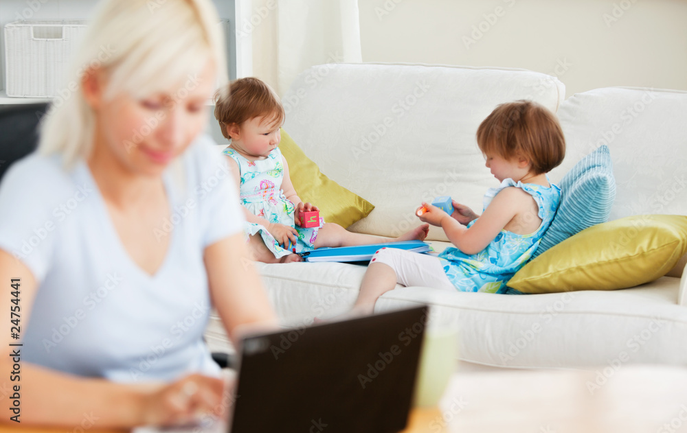 Relaxed family having fun with a laptop Relaxed family having fun with a laptop