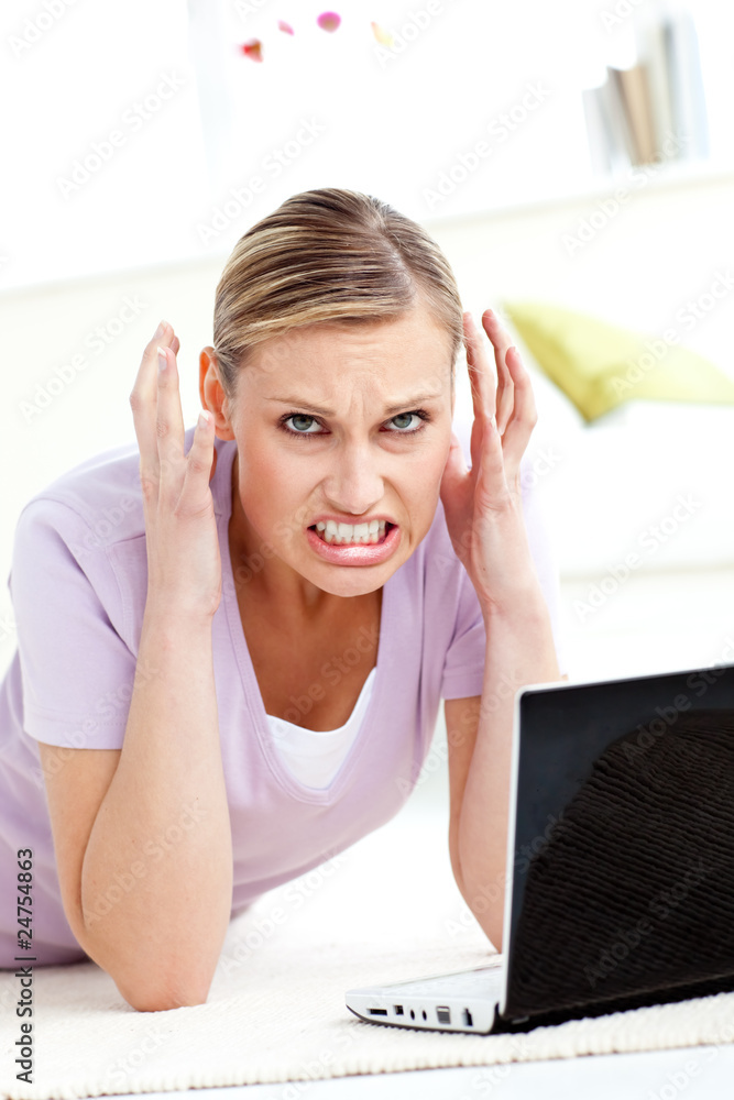 Aggressive young woman using her laptop Aggressive young woman using her laptop