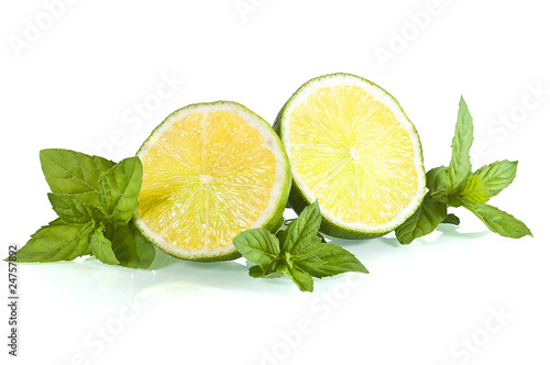 halves of limes on mint leaves