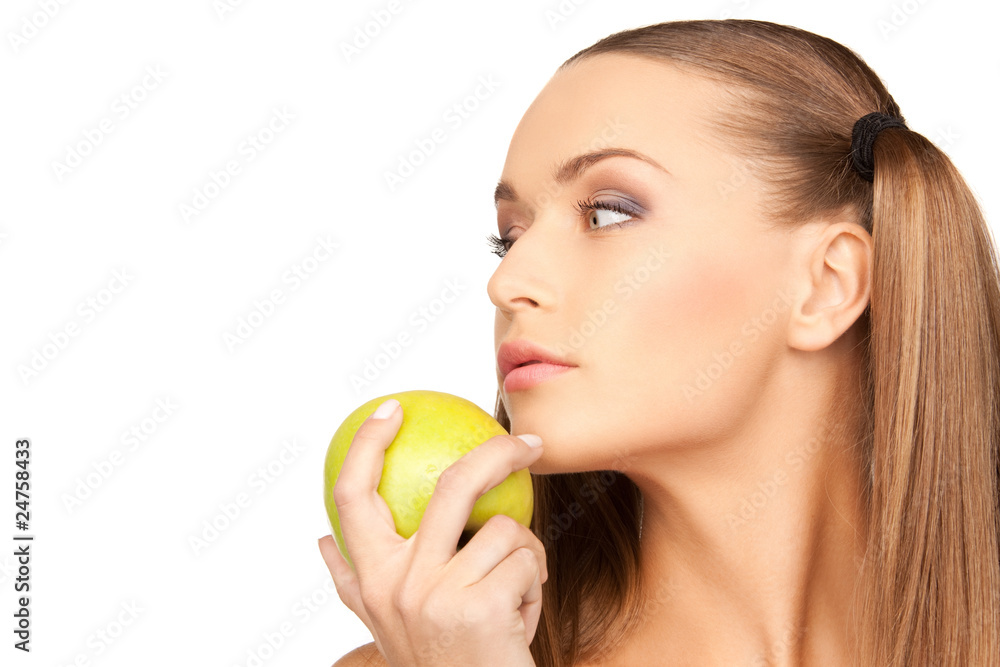 young beautiful woman with green apple young beautiful woman with green apple