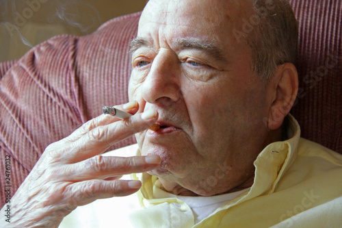 Senior man smoking a cigarette