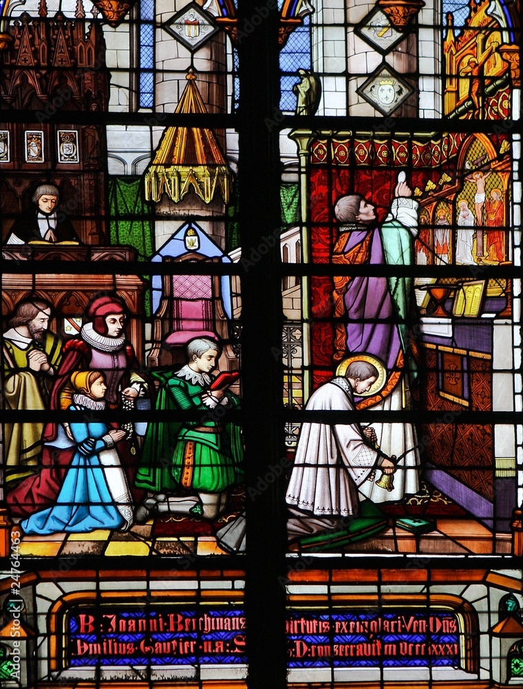 Holy Mass - stained glass church window in Mechelen, Belgium