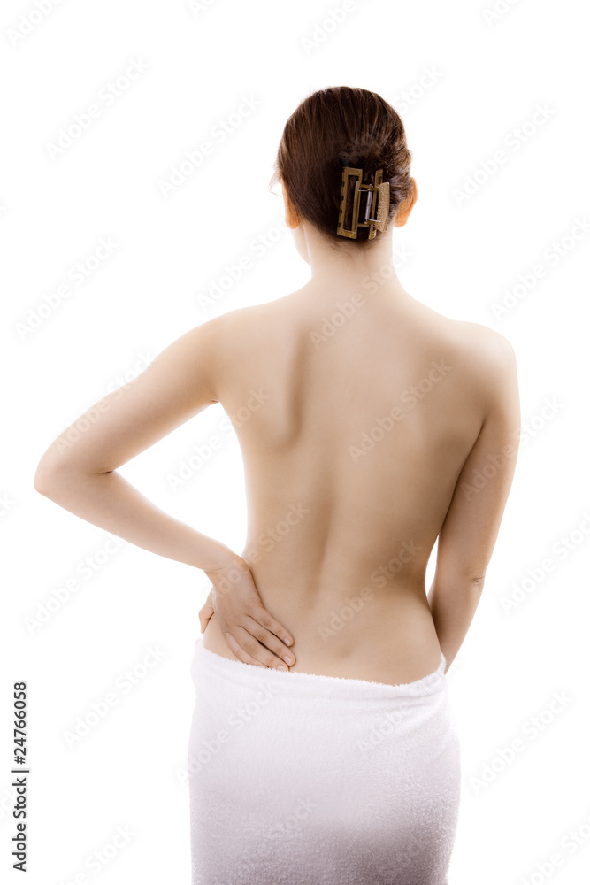 Naklejka premium Woman massaging pain back isolated on white