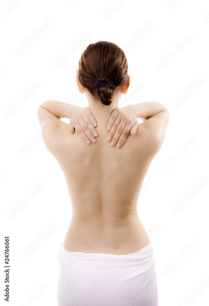 Woman massaging pain back isolated on white Woman massaging pain back isolated on white