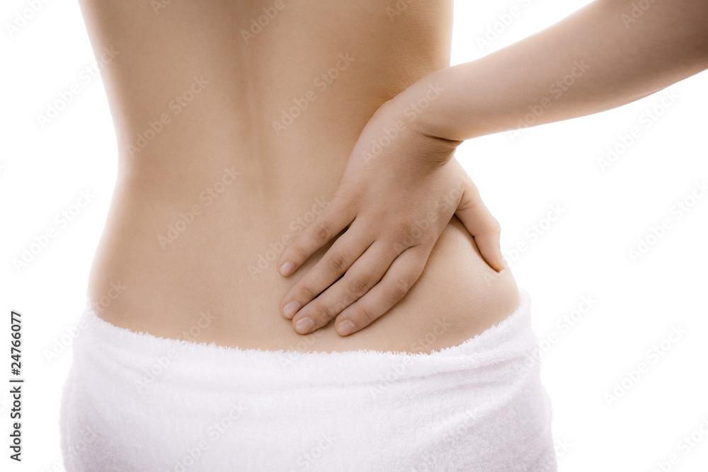 Woman massaging pain back isolated on white Woman massaging pain back isolated on white