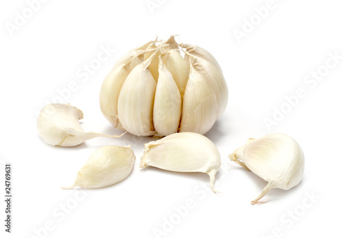 Garlics on white background © Swapan