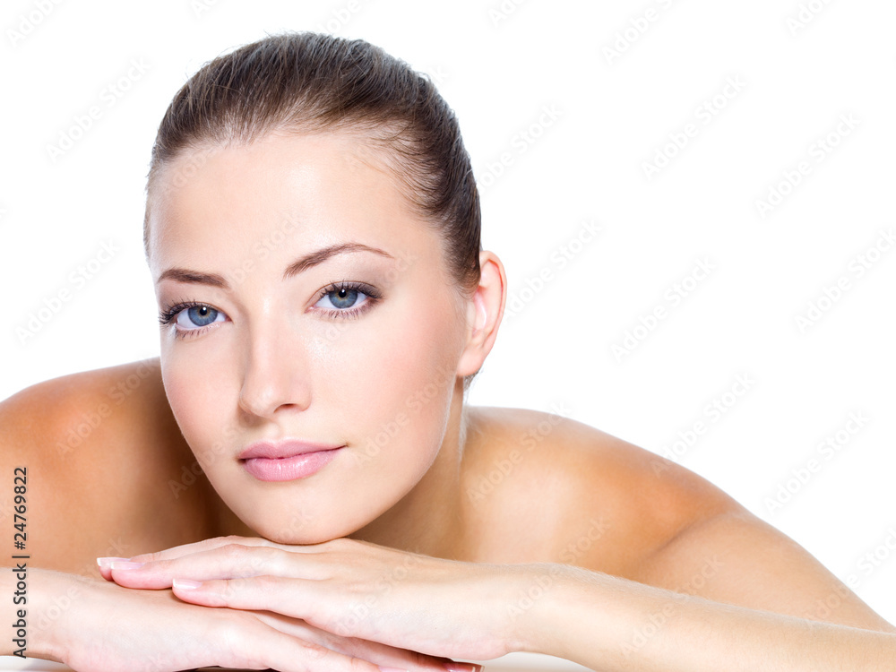 Face of a caucasian beautiful young woman with clean skin Face of a caucasian beautiful young woman with clean skin