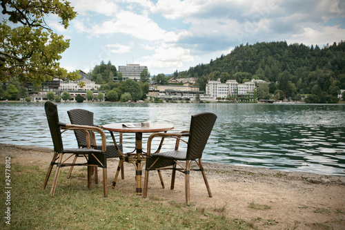 Bar table and chairs near the lake