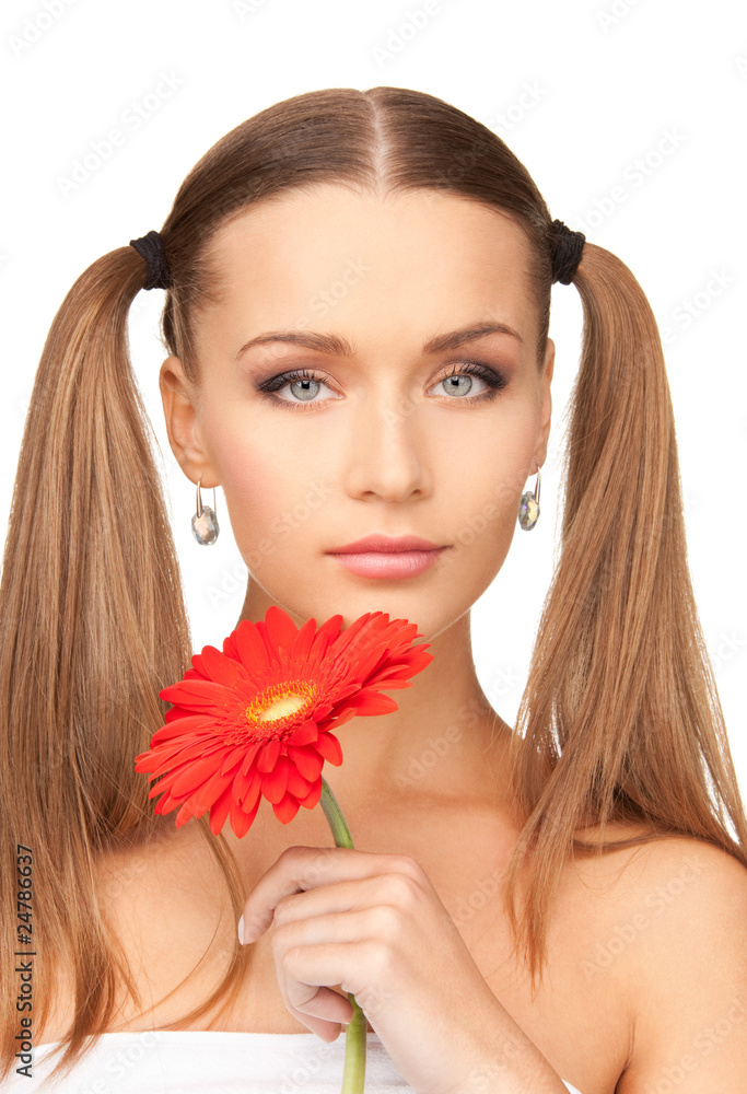 woman in towel with red flower woman in towel with red flower