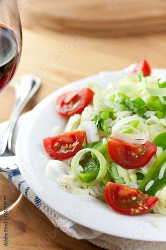 Rice salad with vegetables and red wine