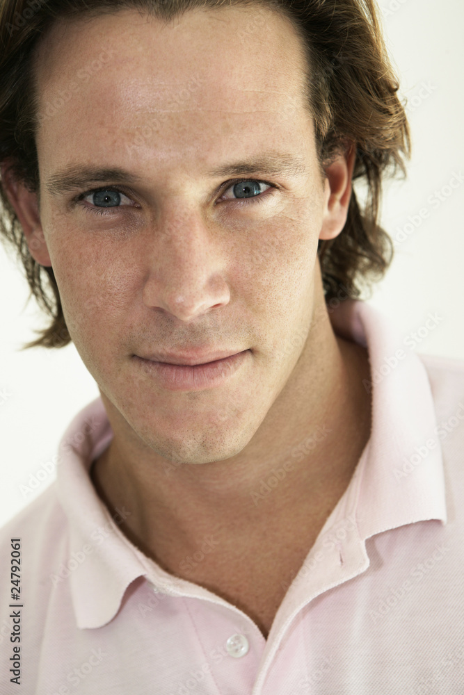 Fototapeta premium Portrait of young male looking to camera