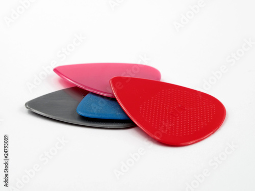 Принти на полотні Closeup of 4 colourful plectrums isolated on white #5