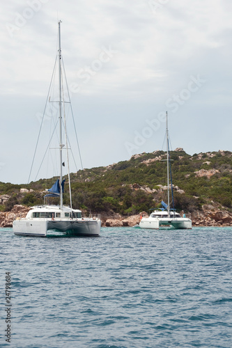 two anchored catamarans near Sardinia