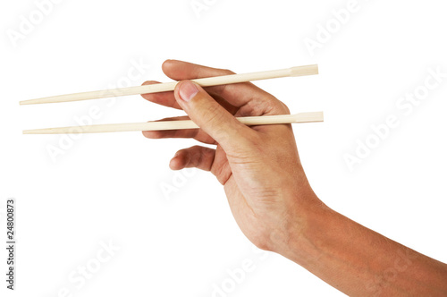 Hand holding chopsticks