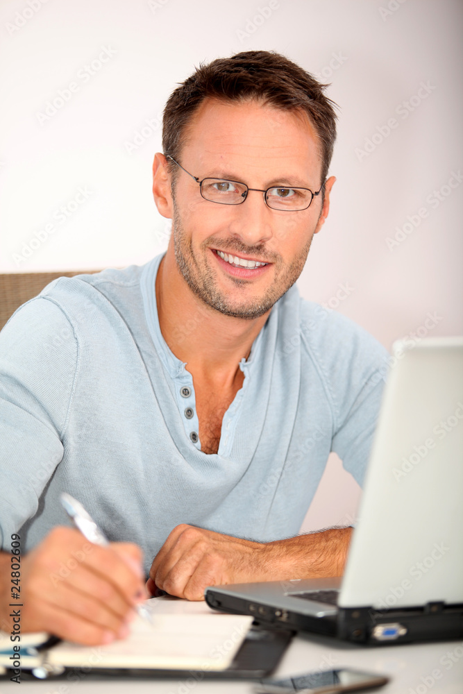 Closeup of man working at home Closeup of man working at home