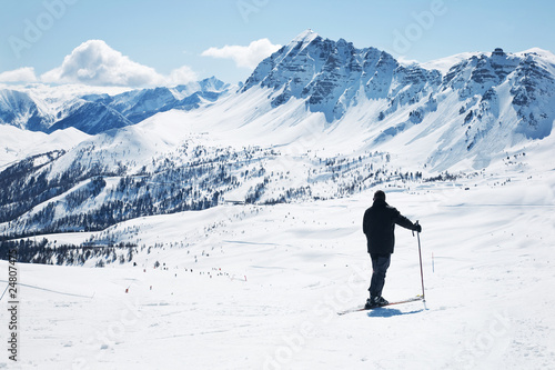 Skier in high mountains