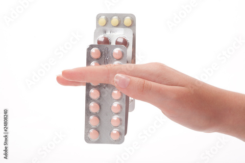 three medical pills container on a female hand, isolated
