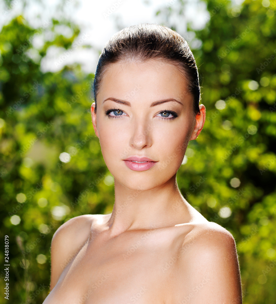 Beautiful fresh female face outdoors Beautiful fresh female face outdoors