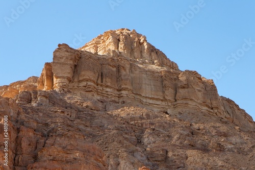 Orange sandstone mountain in the desert
