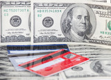Credit/debit bank Cards atop usd paper Money