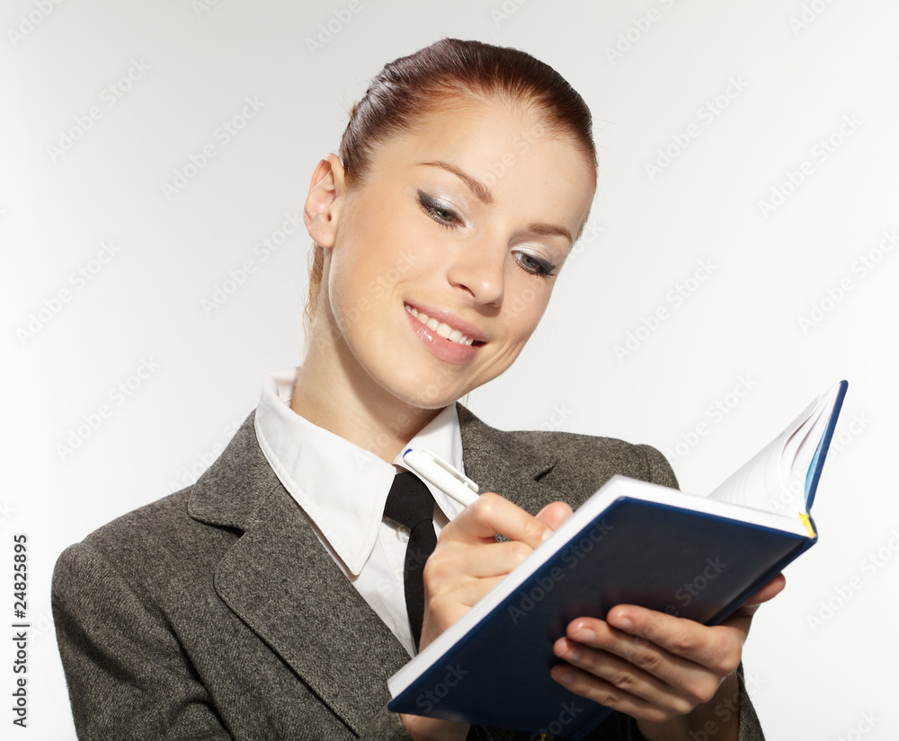 businesswoman wih personal organizer businesswoman wih personal organizer