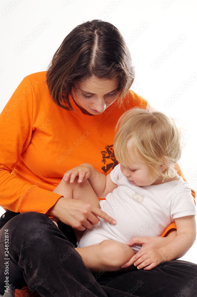 Mother with little blonde girl on the white background