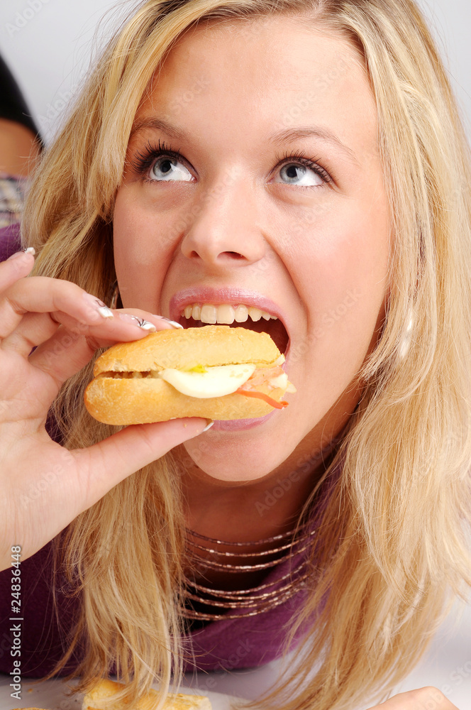 Atractive blonde woman with baguette