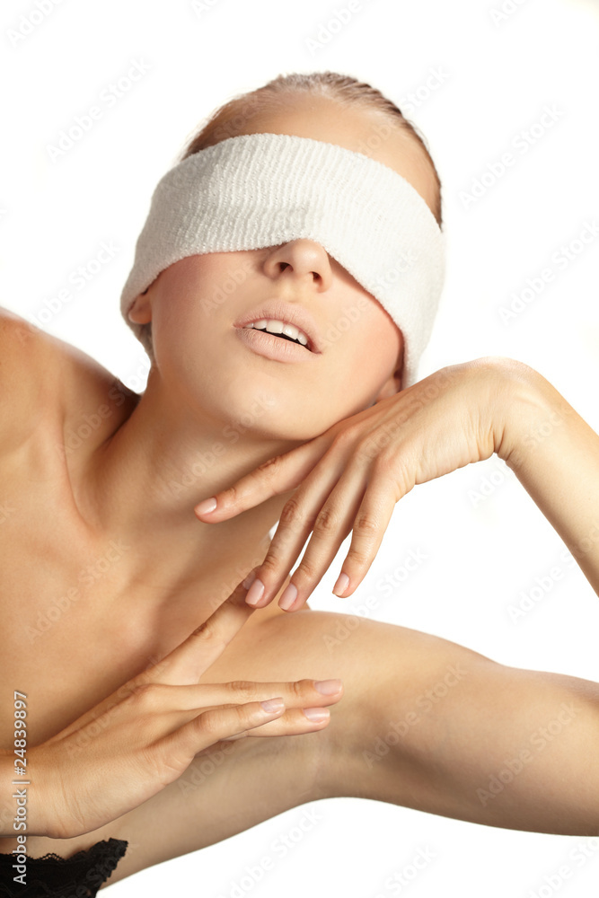 Cute young woman with white band on the eyes Cute young woman with white band on the eyes